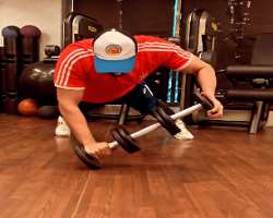 He exercises regularly to maintain his physique.